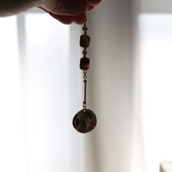 白蘭地戴滿月夜穿的耳環- 第7張的照片