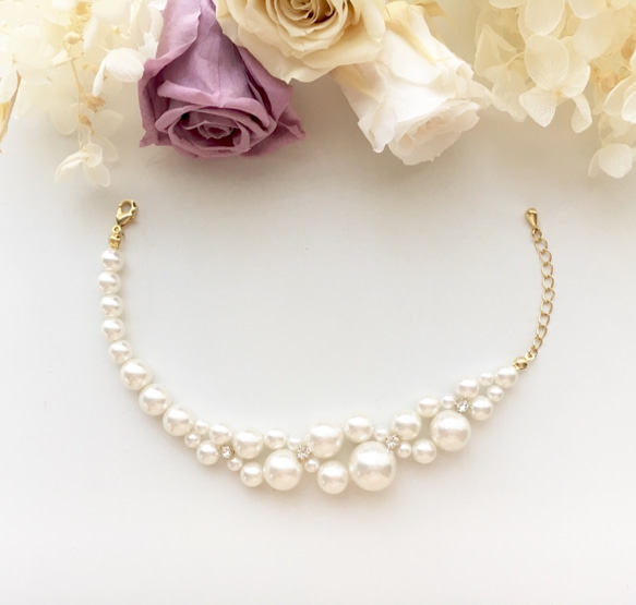 パールとスワロフスキーのアシンメトリーブレスレット 2枚目の画像