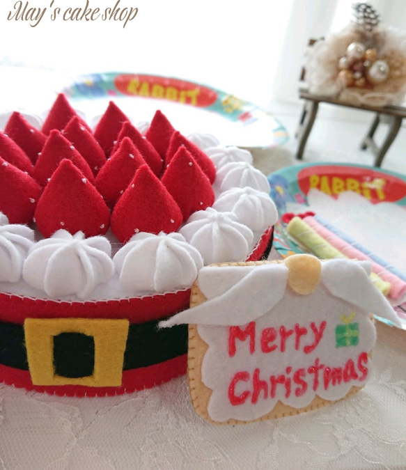 フェルトのクリスマスホールケーキ    サンタクロースホールケーキ 1枚目の画像