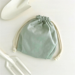 棉麻帆布側邊兩折抽繩小袋，綠色 第2張的照片