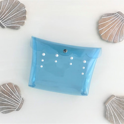 扇形透明義大利鉚釘翻蓋小包裝淺藍色 第1張的照片
