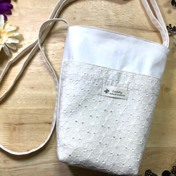 [Walking pochette] 碎花蕾絲，可調節繩長 第1張的照片