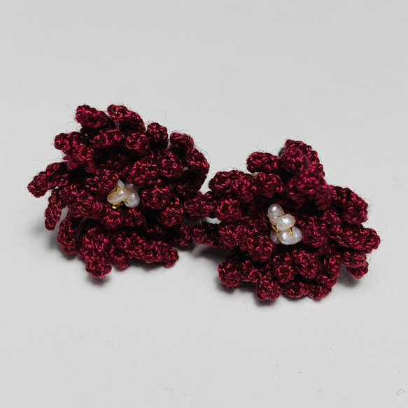 手編みのお花イヤリング 1枚目の画像