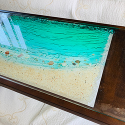 折りたたみガラスセンターテーブル   エメラルドグリーンムーンビーチ 波紋 水面 揺らめきの海 3枚目の画像