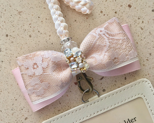 MCM 名刺入れ ストラップ付 リボン カードケース Beige+Pink MCM 名刺入れ ストラップ付 リボン カードケース Beige+Pink