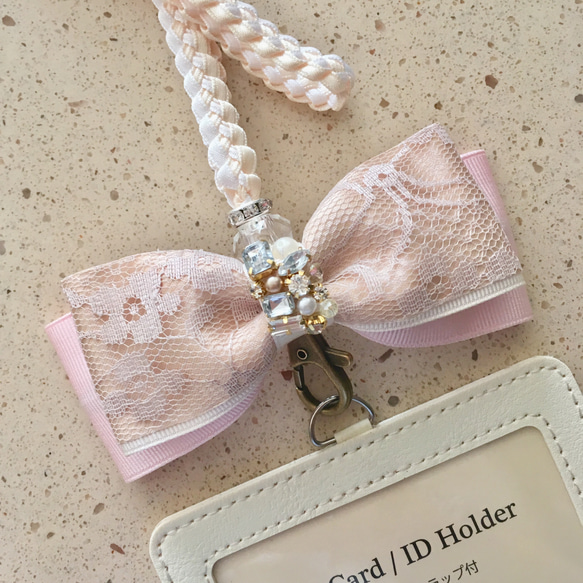 MCM 名刺入れ ストラップ付 リボン カードケース Beige+Pink MCM 名刺入れ ストラップ付 リボン カードケース Beige+Pink