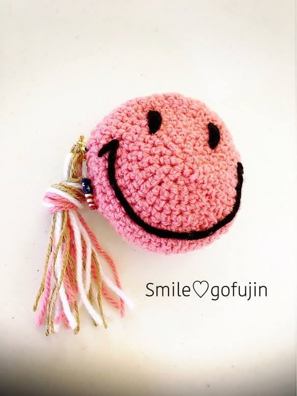 ピンク毛糸のニコちゃんコインケース 1枚目の画像