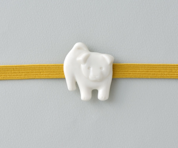 白磁の帯留（子犬） 1枚目の画像