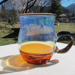 耐熱ガラスのマグカップ　２　オレンジブルー 1枚目の画像