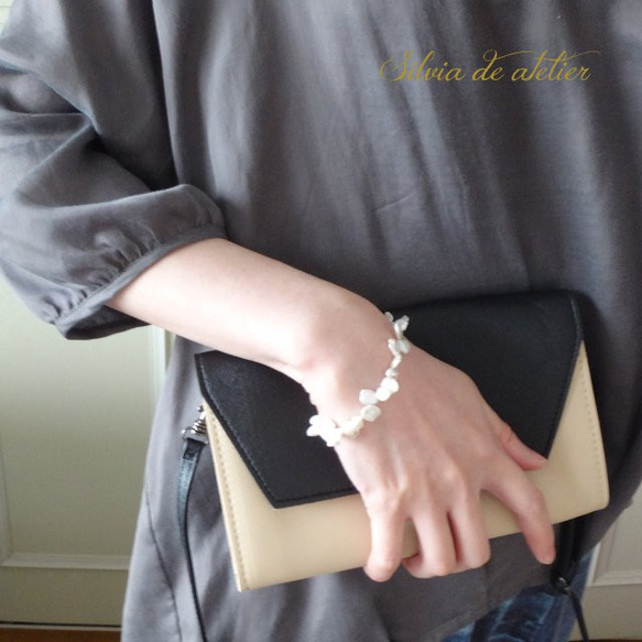 【出售·剩餘1】花瓣Kespearl白色淡水珍珠磁鐵手鍊 第1張的照片