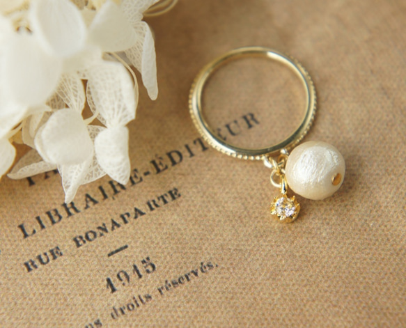 方晶鋯石與棉珍珠的戒指 第2張的照片