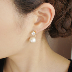 耳針式或耳夾式耳環 ◇白水晶◇施華洛世奇與棉珍珠耳扣的耳環 第1張的照片