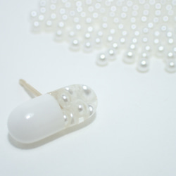 カプセルピアス（両耳）/ pair of pearl capsule earrings 1枚目の画像