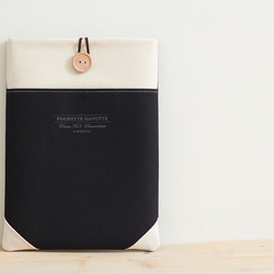 筆記本電腦包，黑色和未漂白 11 號帆布，木質按鈕 第1張的照片