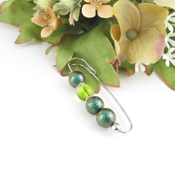 遠目に見るオリビンクォーツは、やがて地となり、山となる。<カブトピンブローチ>SB829 1枚目の画像