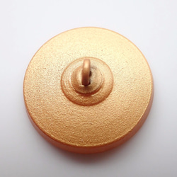 チェコのボタン　金茶に水色の渦巻き 2枚目の画像