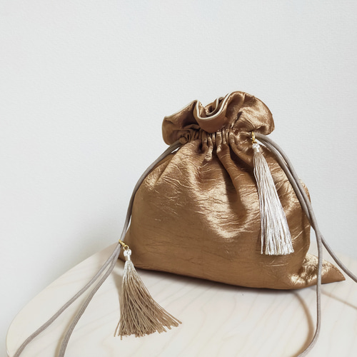 再販〉取りはずせるタッセル巾着 ブロンズ 巾着バッグ Regenbogen 通販
