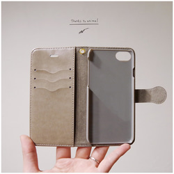 原裝筆記本型iPhone外殼“行李” 第4張的照片