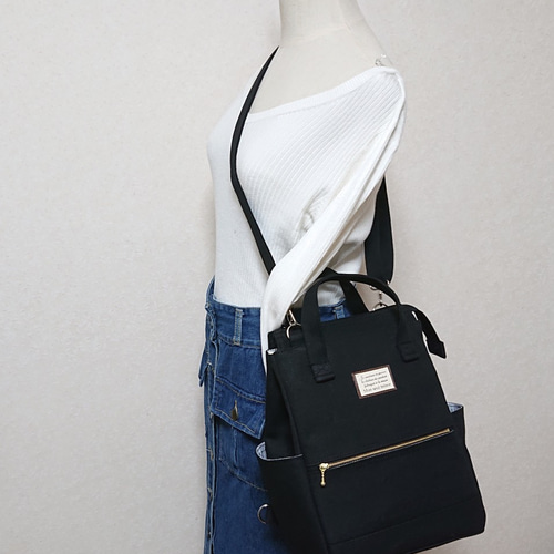 大きな大きな目玉が付いた四角いリュック スクエアリュック02 マチ10cm 黒 / 6号帆布 | aoya bags
