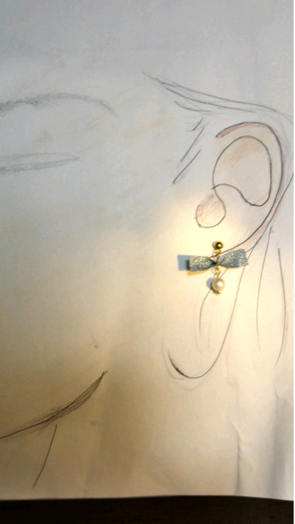 コットンパールのリボンピアス 2枚目の画像
