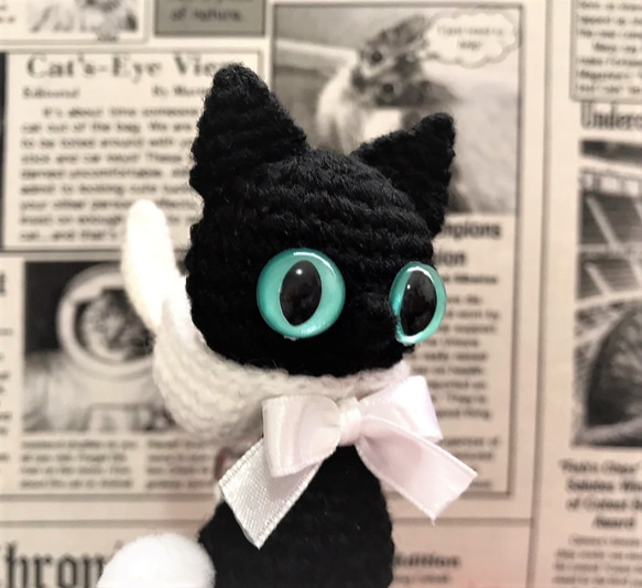 うさぎフードのぺったんこ黒猫*あみぐるみ☆受注製作品 3枚目の画像