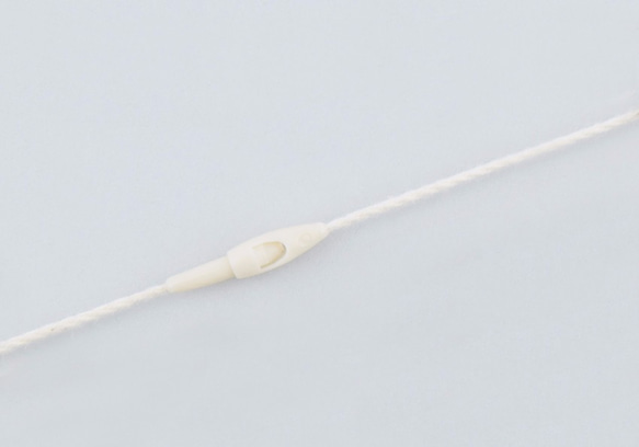 糸ロックス-Ｒ【コットン/20cm/100本入】　さげ札用糸ファスナー　ナチュラルな風合いが特徴です 4枚目の画像