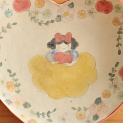 粉末狀的白雪公主心形盤。 第2張的照片