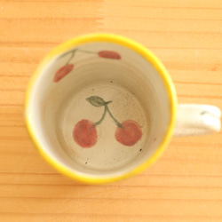 杯在powder粉的櫻桃的桃紅色邊界。 第4張的照片