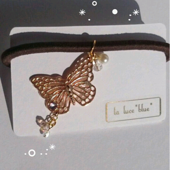 ~Butterfly hair jewelry~ 蝶々 ピンクゴールド キラキラビーズ ヘアゴム 1枚目の画像