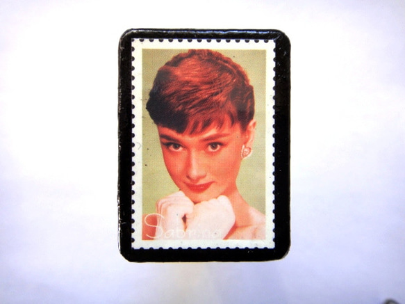 アメリカ 「切手シールブローチ」100 1枚目の画像