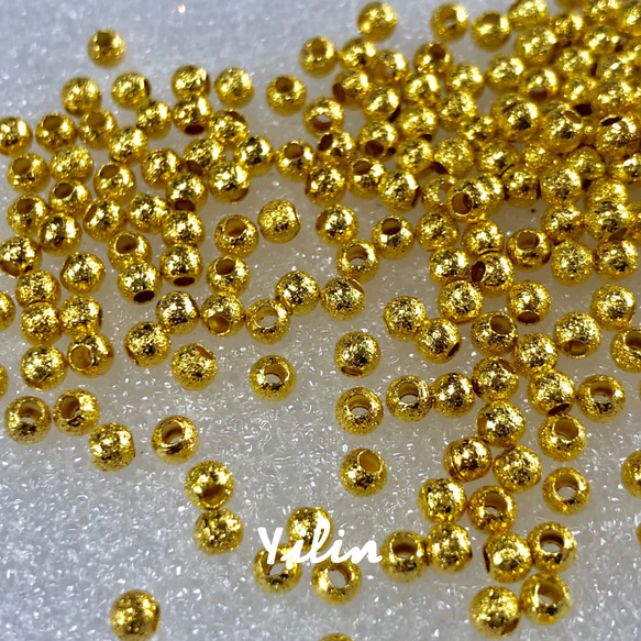 P001☆金属パーツ•メタルビーズ•3mm•ゴールド•金色•艶消し仕上げ☆100個入り 2枚目の画像