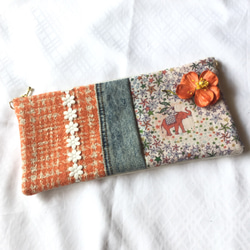orange tweed flower clutch bag 1枚目の画像
