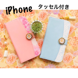 iPhone 案例筆記本類型粉紅色花藍色花邊 第1張的照片