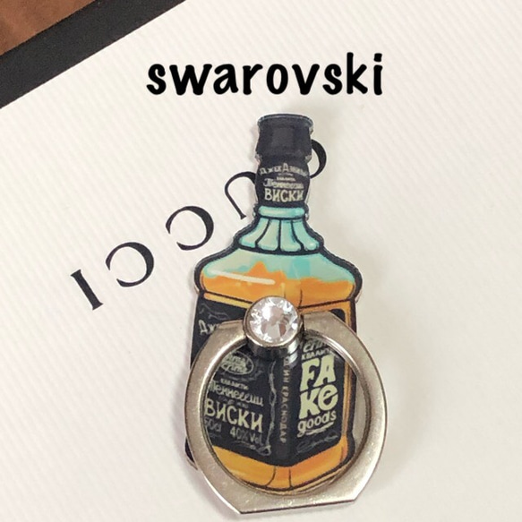 スワロフスキー つき　バンカーリング スマホリング ウイスキー 1枚目の画像
