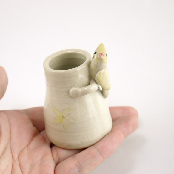 雞尾鸚鵡的小花瓶（鳥對象） 第1張的照片