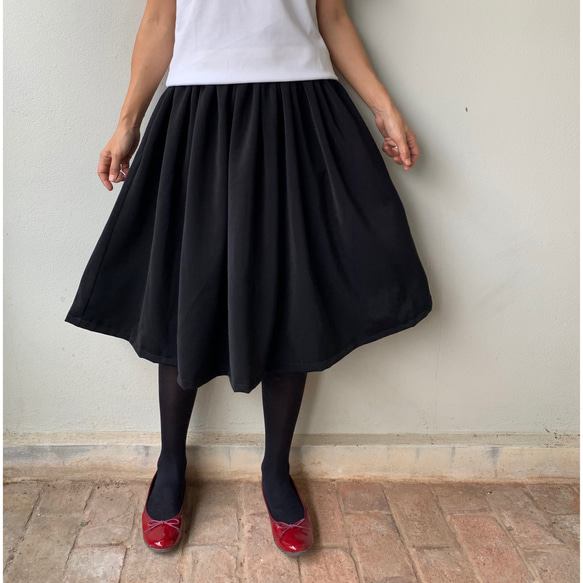 優秀スカート。いつも頼りたくなるフレアたっぷりギャザースカート 。 コーデを華やかに魅せてくれる。黒色　フォーマルも。 5枚目の画像