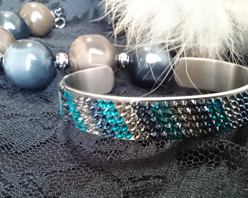 スワロフスキー　バングル　未使用品！ SWAROVSKI - スワロフスキー ツイスト バングル メタル 【中古