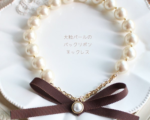 ベイビー♡花立体パールチェーン♡リボン♡ホワイト♡未使用品 ベイビー♡花立体パールチェーン♡リボン♡ホワイト♡未使用品