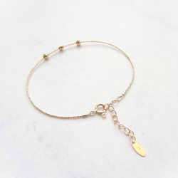 K18 Skin Jewelry ◆ 日本 18K 金鏡面切割球極細可調整記憶手環 ◆ Solid Gold 第4張的照片