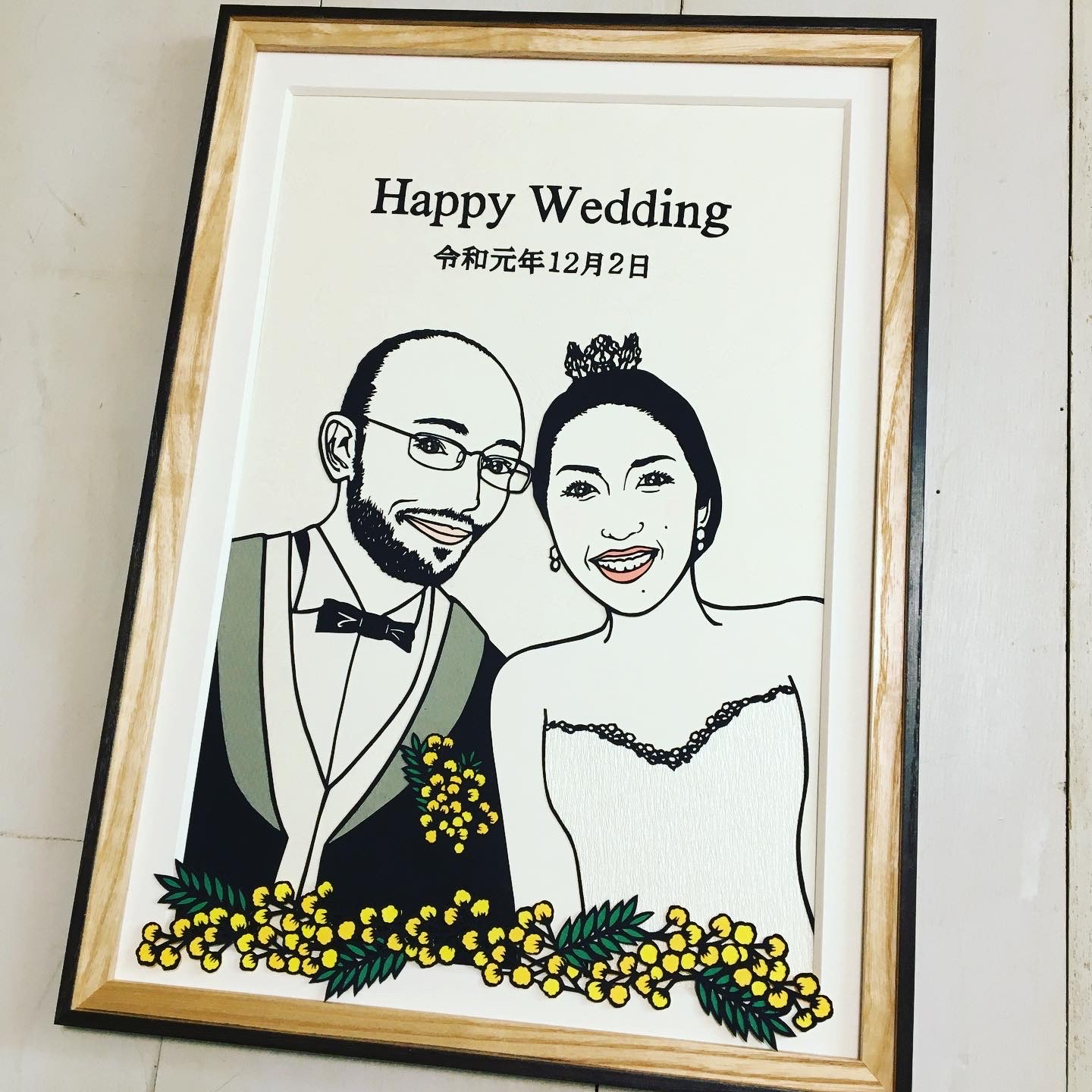 切り絵の似顔絵、ご希望のお花をプラスして