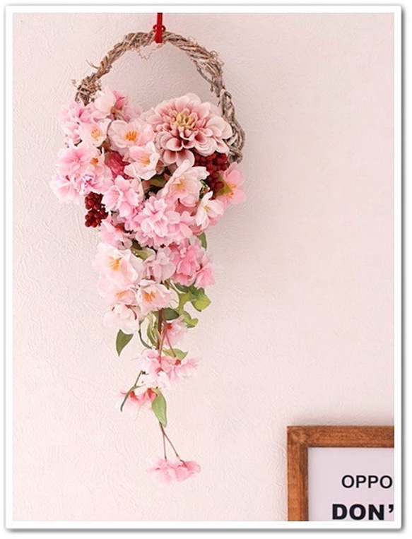 【春リース】流れるように桜満開、バッグ型リースの壁飾り。「Creema限定」 1枚目の画像