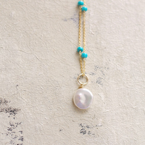 Pearl maru keshi（charms）圓形罌粟珍珠吊飾 第1張的照片