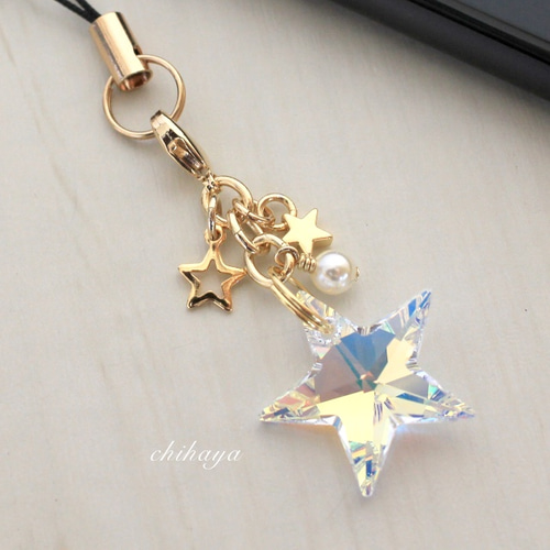 Swarovski キラキラ☆星（ゴールド）のストラップ / イヤホン