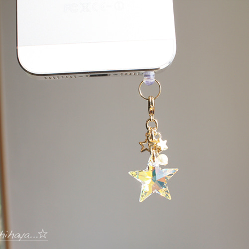 話題の行列 Swarovski キラキラ☆星（ゴールド）のストラップ イヤホン / 乳液・ミルク