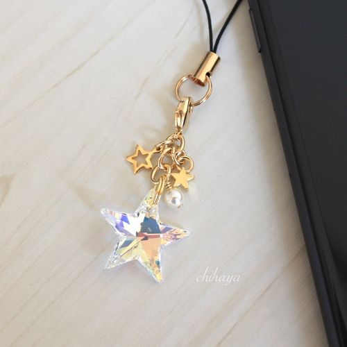 Swarovski キラキラ☆星（ゴールド）のストラップ / イヤホン