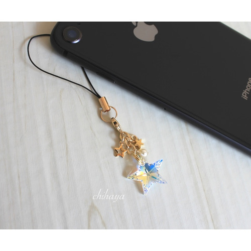 Swarovski キラキラ☆星(ゴールド)のストラップ / イヤホン Swarovski キラキラ☆星(ゴールド)のストラップ / イヤホン