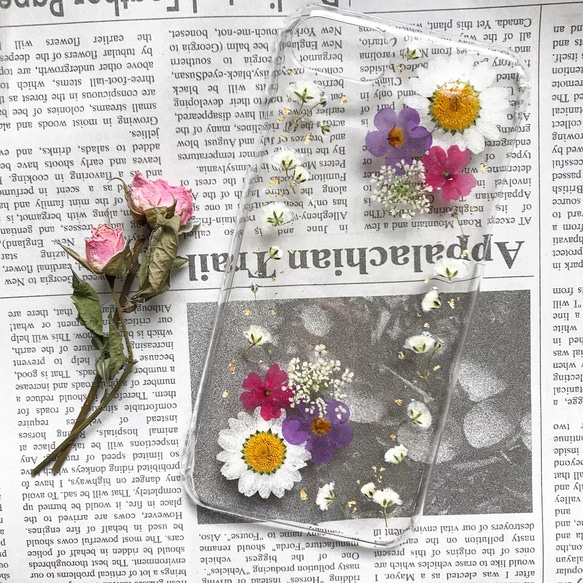 お花のふんわりスマホケース 1枚目の画像