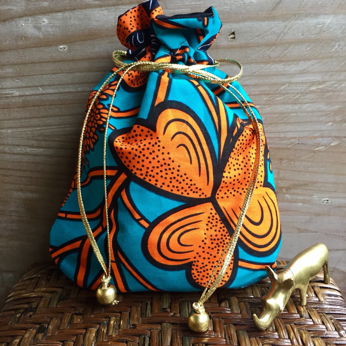 アフリカン8.5がま口ポーチ　アフリカ布オレンジ、イエロー系