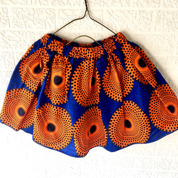 アフリカン キッズスカート(フリー120-140)ブルー/オレンジトライバルサークル柄パーニュキテンゲバティック一点物 5枚目の画像