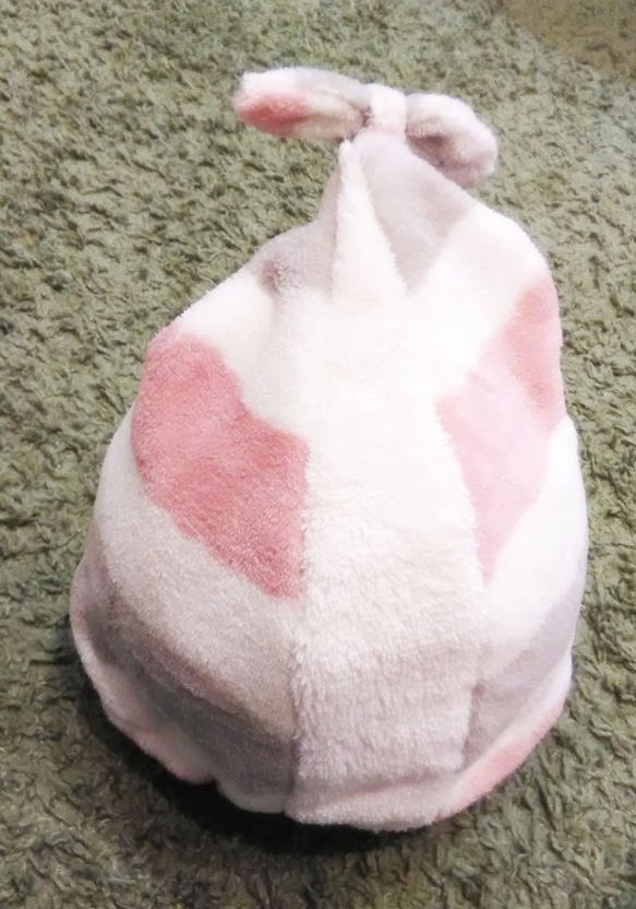 毛巾蓋粉紅色邊框 第4張的照片